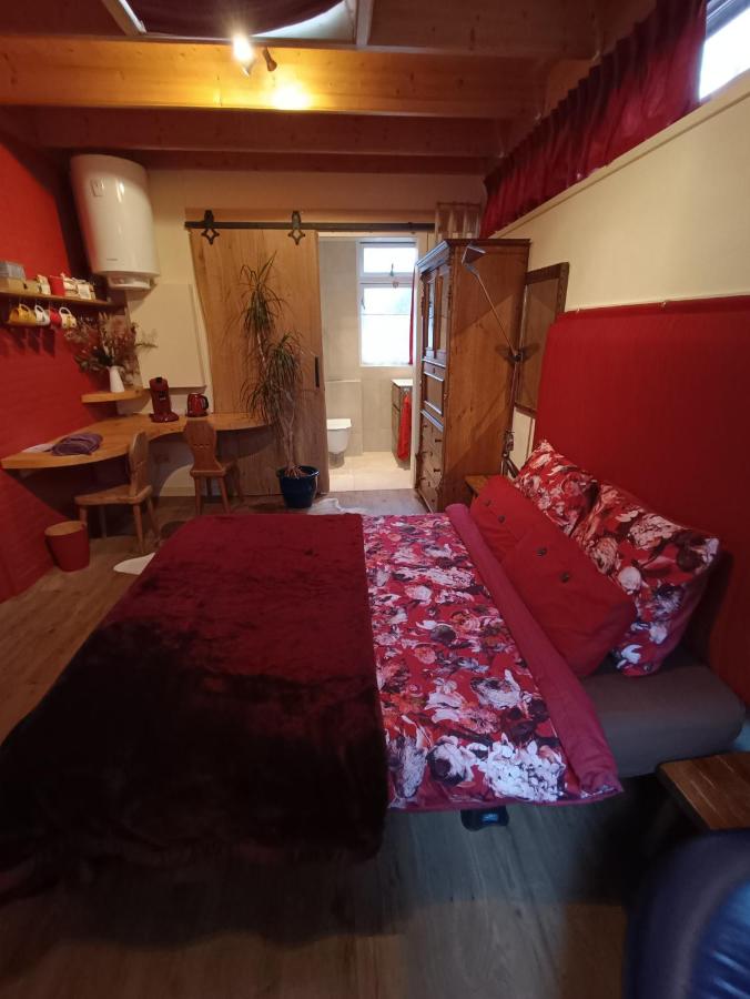 Een bed of bedden in een kamer bij Bed and Breakfast Opus 209