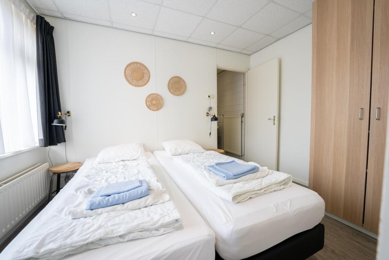 Een bed of bedden in een kamer bij De Berkenhof