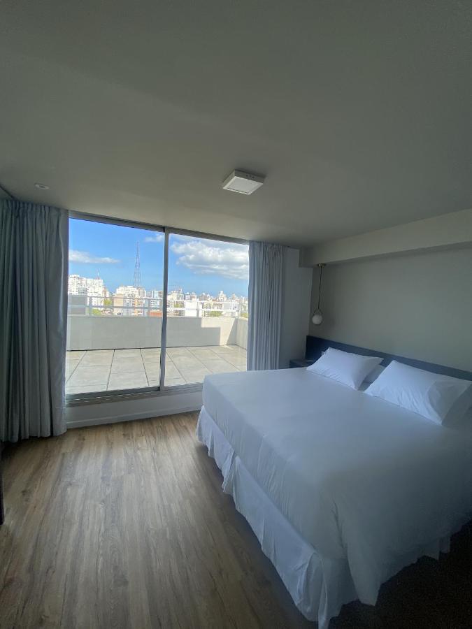 Hotel Ciudadano Suites — quarto