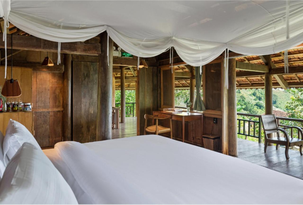 Giường trong phòng chung tại Cao Lan Hamlet