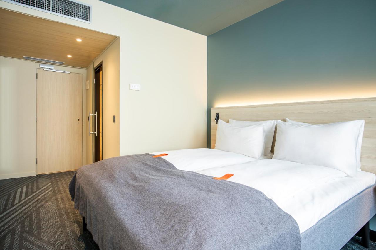 Een bed of bedden in een kamer bij Citybox Brussels