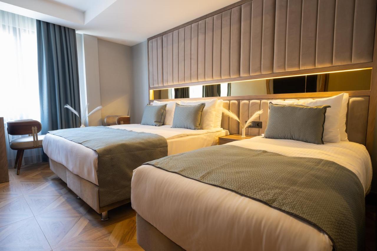 Deluxe Üç Kişilik Oda