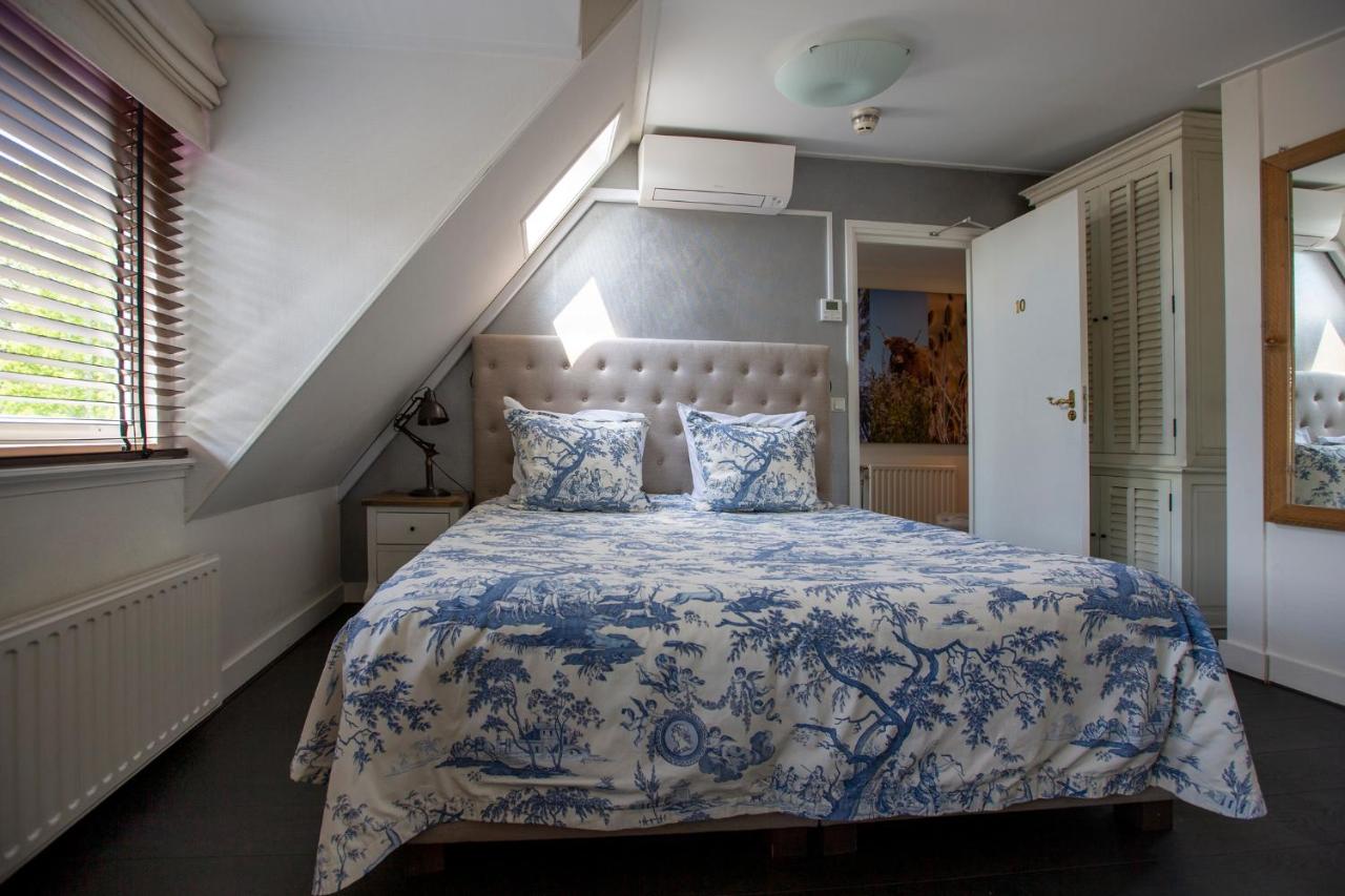 Een bed of bedden in een kamer bij Zenzez Hotel & Lounge