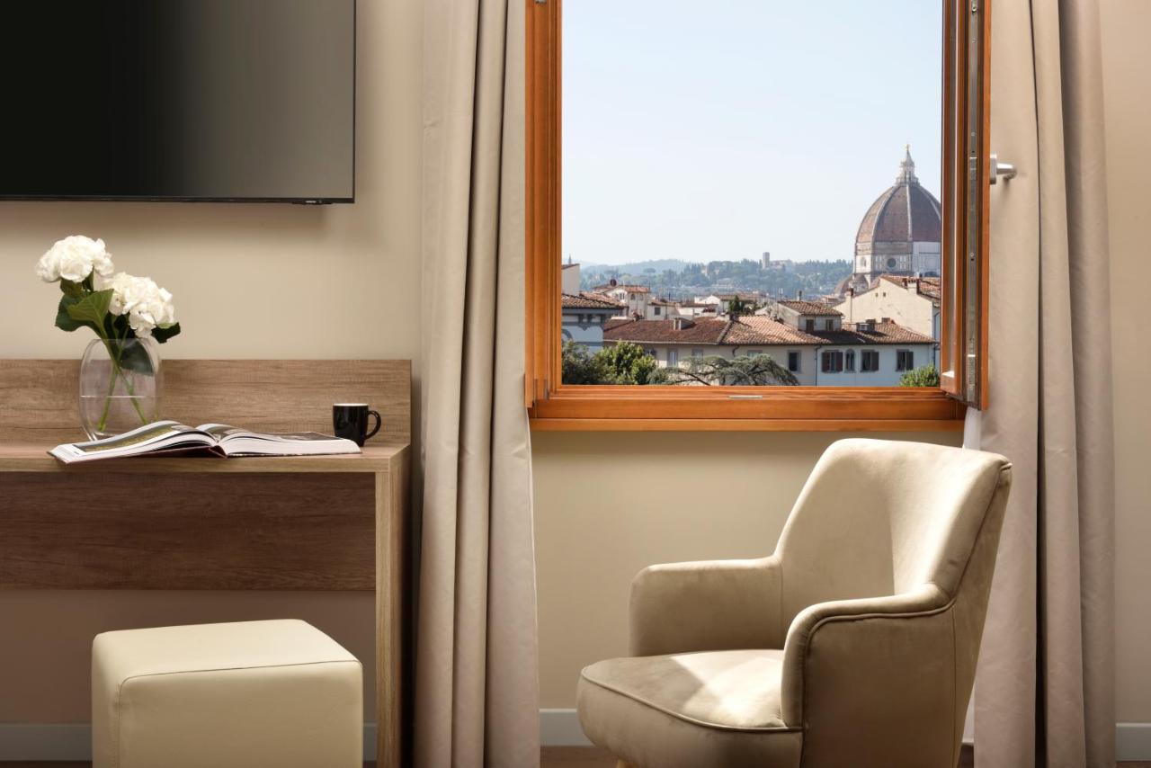 Essence Hotel — quarto