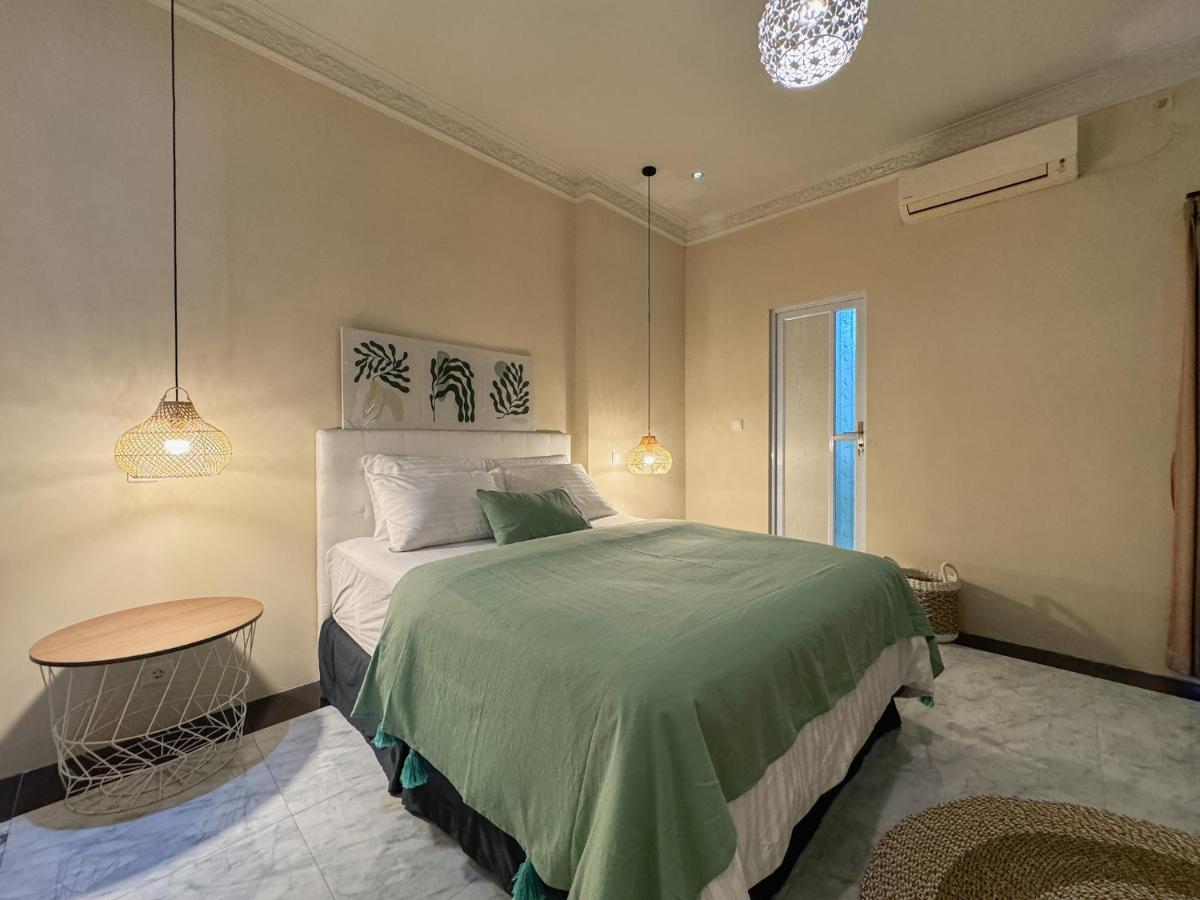 Merdeka Kuta Guesthouse - 4