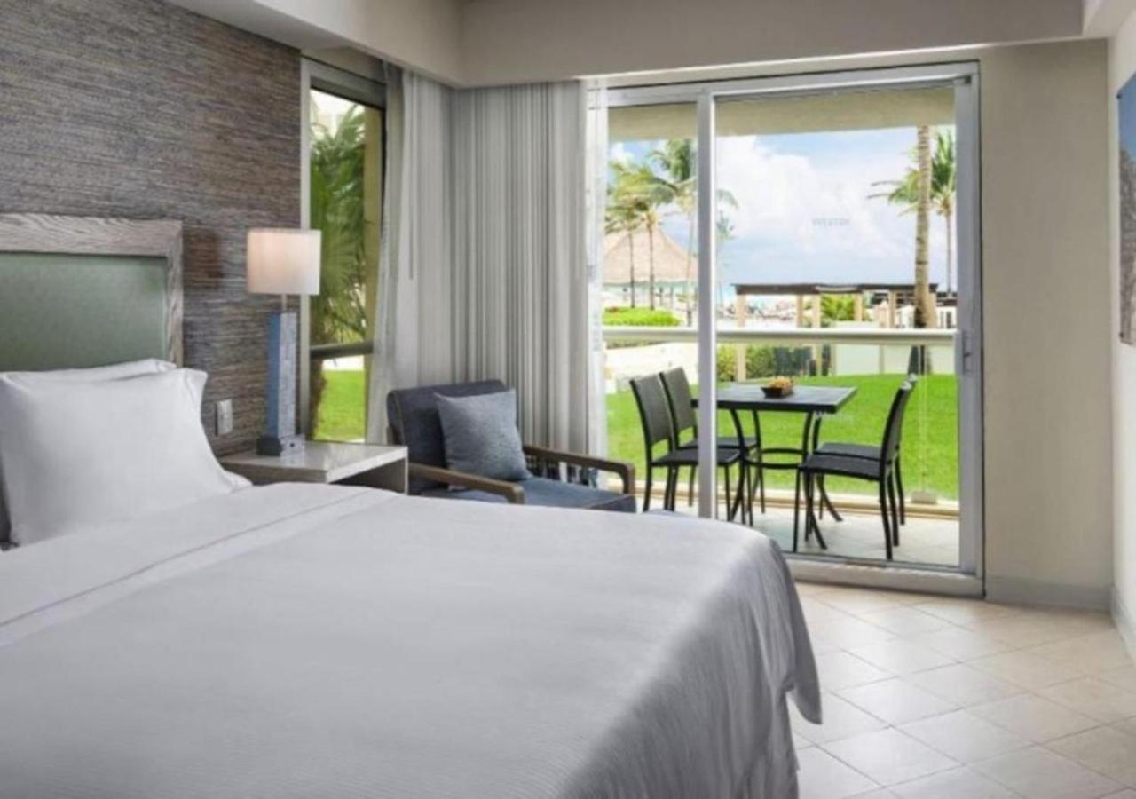 Enjoy the white sand resort beach in a 1BD vacation condo onsite infinity pool, spa, and mini golf - 3