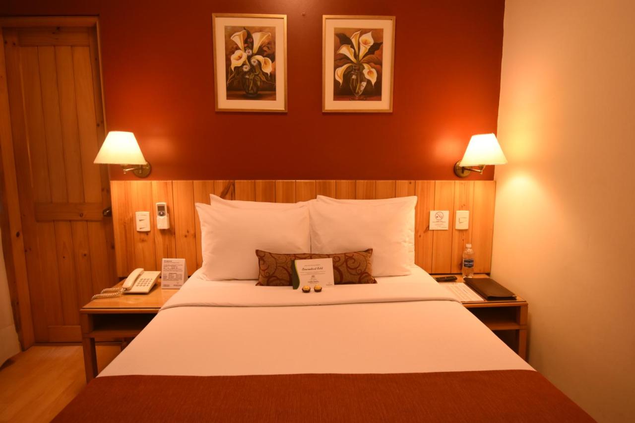 Qorianka Hotel — quarto