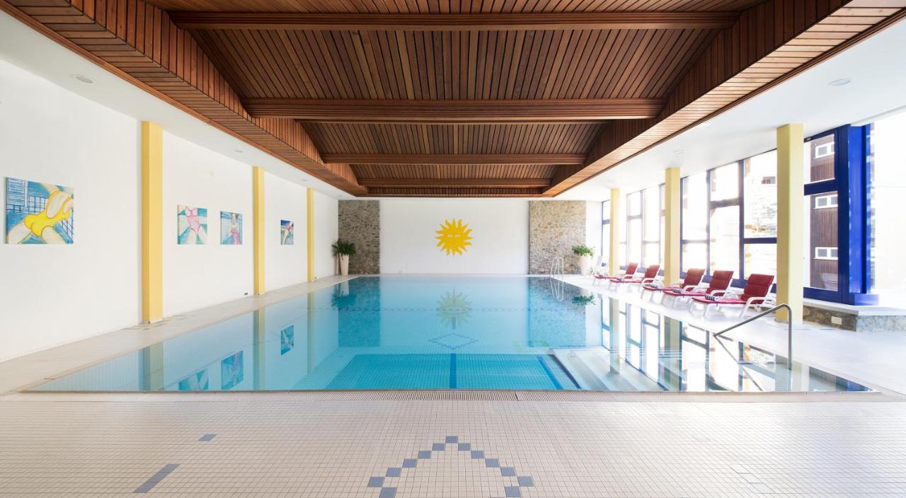 Heated swimming pool: Hotel Europa St. Moritz