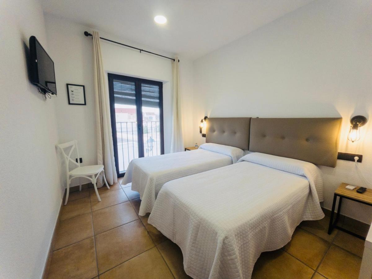 Cama o camas de una habitación en La Troje Boutique