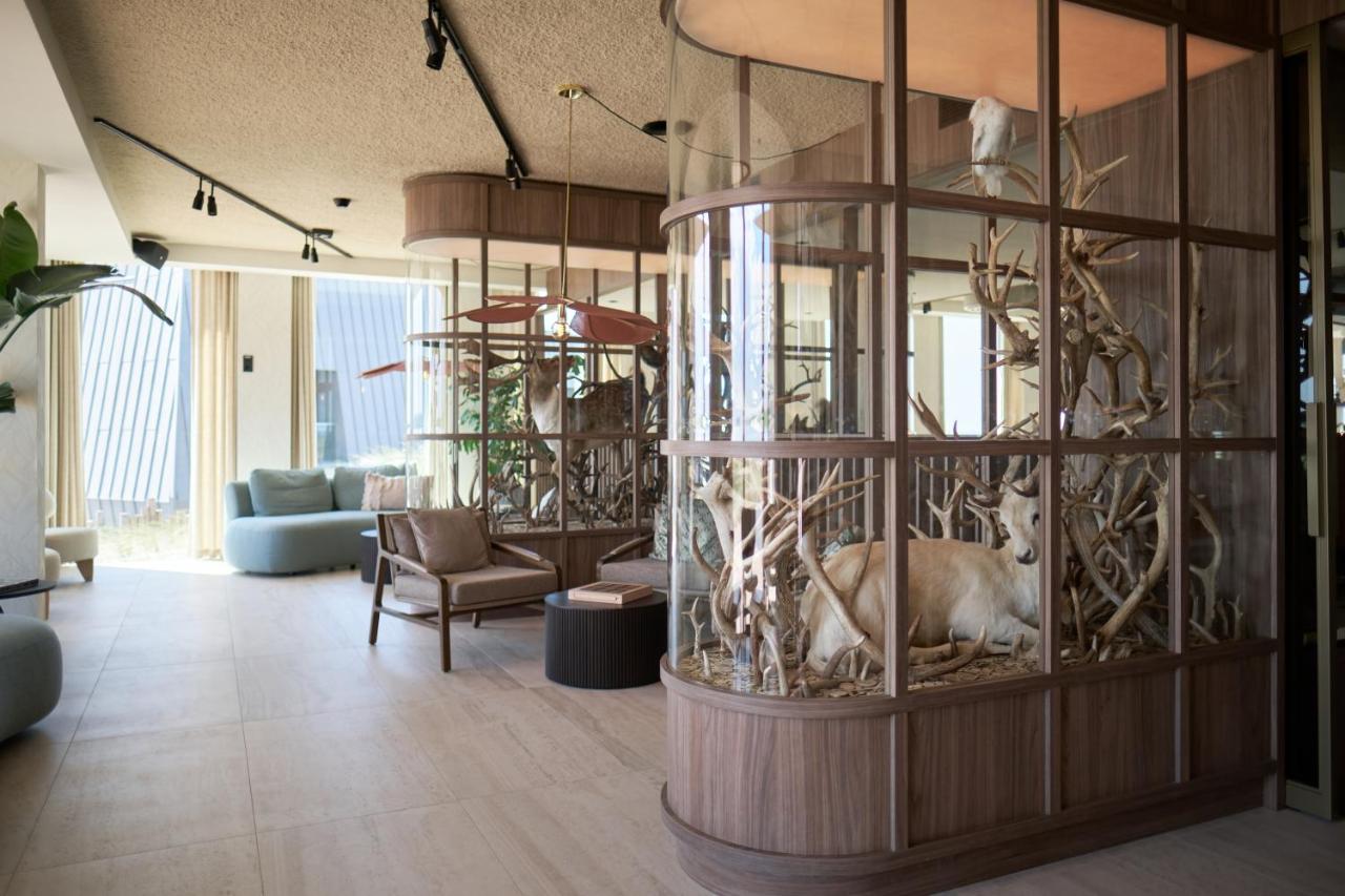 Een zitgedeelte bij Boutique Hotel Blendin Bloemendaal aan Zee