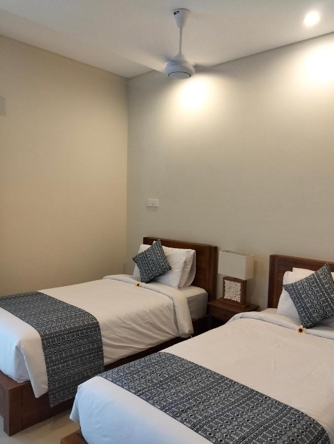 Kutus Bali Guesthouse — quarto