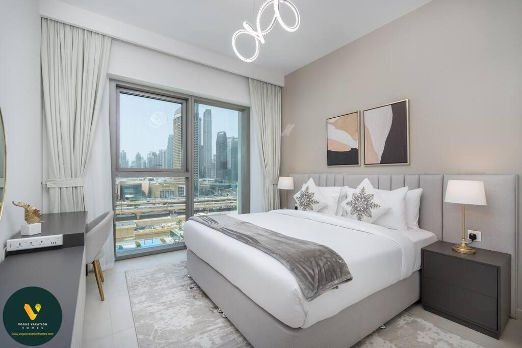 Vogue Vacation Homes, Downtown Views II with Direct Access to Dubai Mall Via a Climate Controlled Bridge, Two Bedroom Apartment with Balcony and Burj Khalifa View - 4