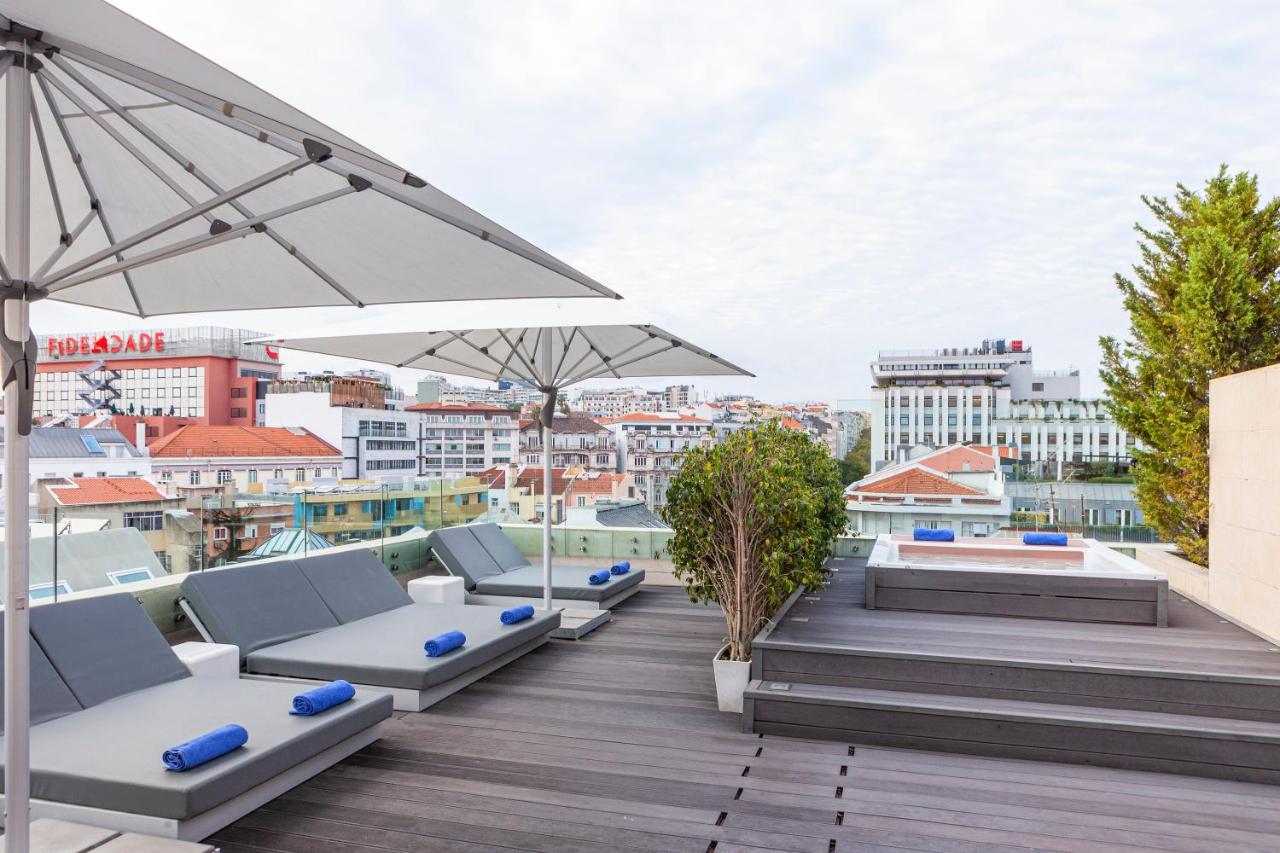 Altis Prime Hotel — quarto