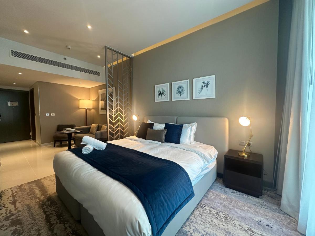 Quickstay holiday homes Modern studio with a Pool view at DAMAC Maison Prive