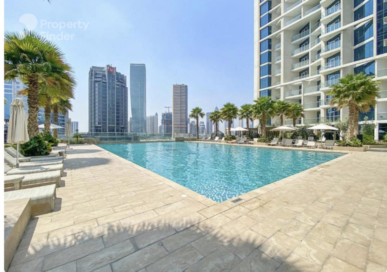 Quickstay holiday homes Modern studio with a Pool view at DAMAC Maison Prive - 4