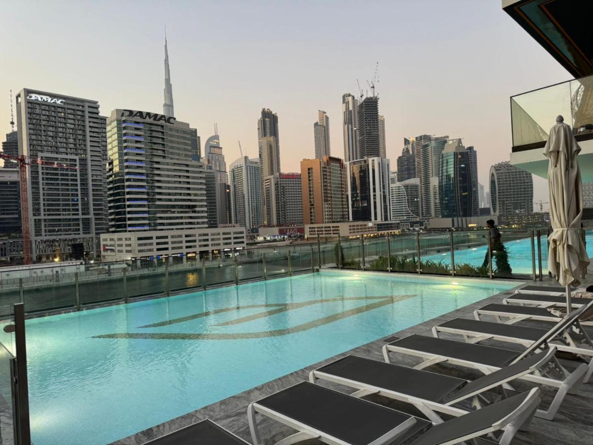 Burj Khalifa Poolview 1BR Apartment for 4 people
