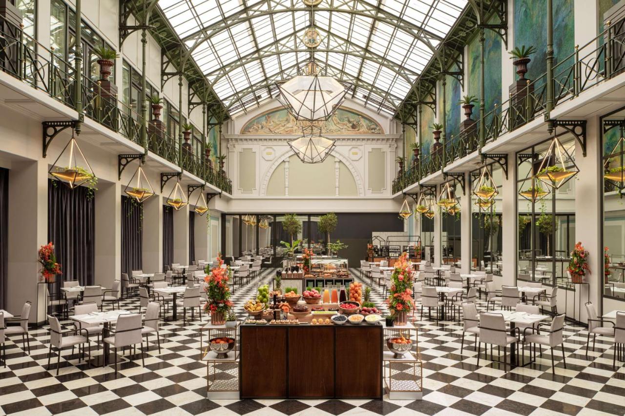 Een restaurant of ander eetgelegenheid bij Anantara Grand Hotel Krasnapolsky Amsterdam