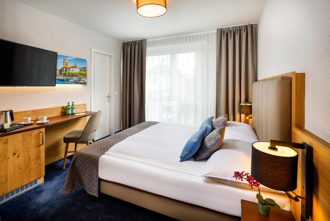 Hotel Tivoli in Zurich - Smarter Komfort, nahtloses Reisen: Ihre Zürcher Verbindung im Hotel Tivoli.