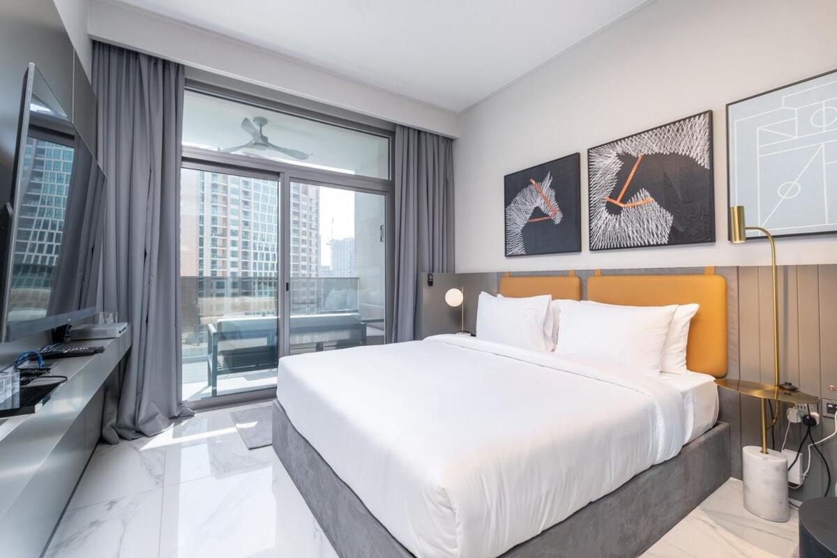 Vogue Vacation Homes, Downtown Mag 318 near Burj Khalifa and Dubai Mall, Studio Apartment with Balcony, Canal and City View, Access to all Amenities - 4