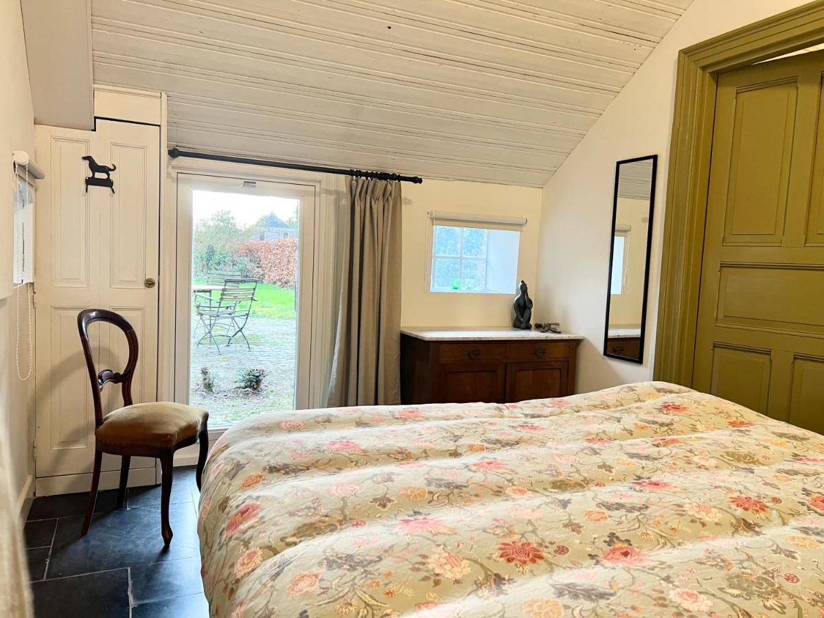 Een bed of bedden in een kamer bij Westgaerde20