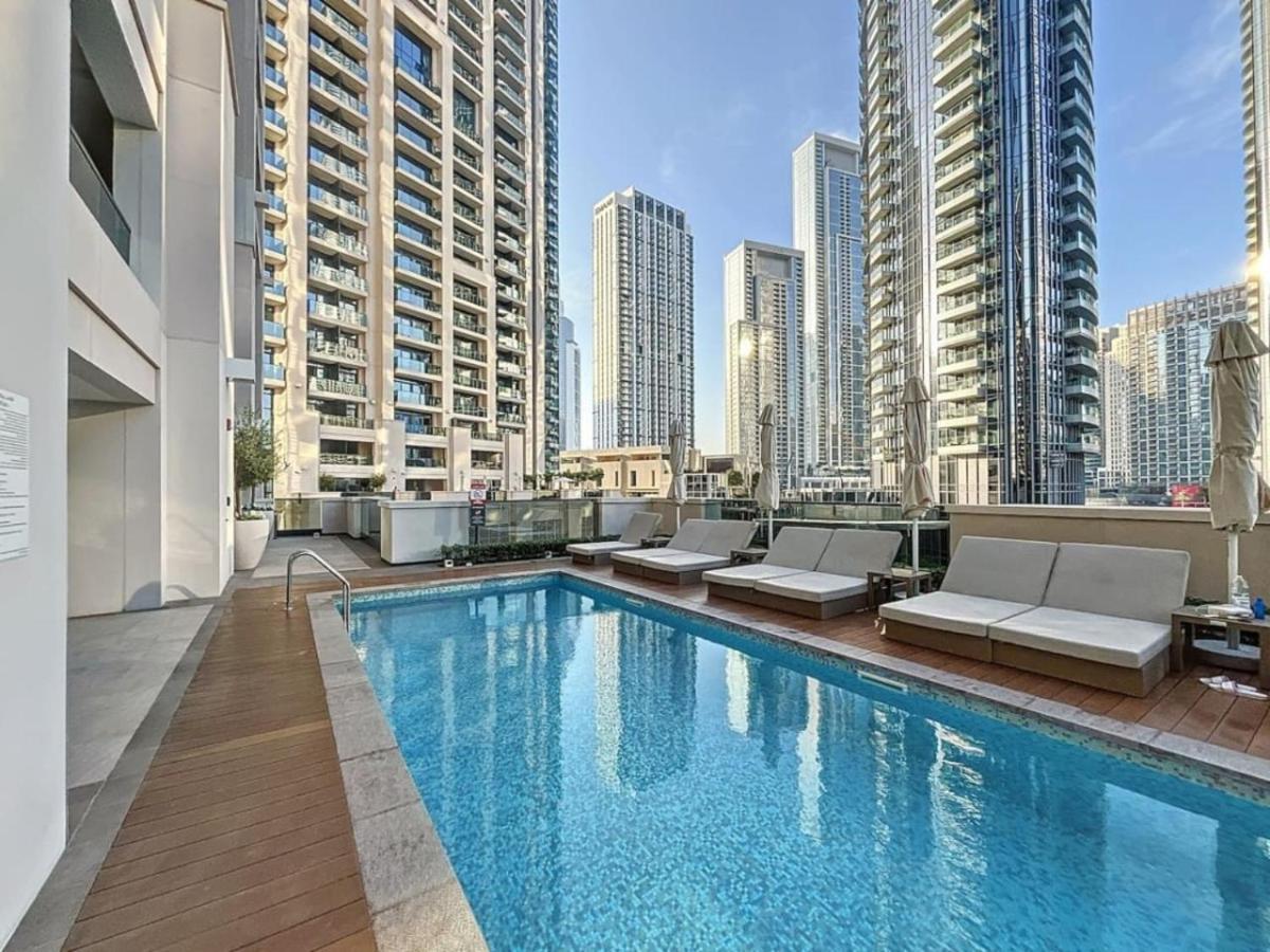 Vacationer Holiday Homes I Exquisite 1 Bed l Pool Access which has Burj Khalifa View l Downtown - 4