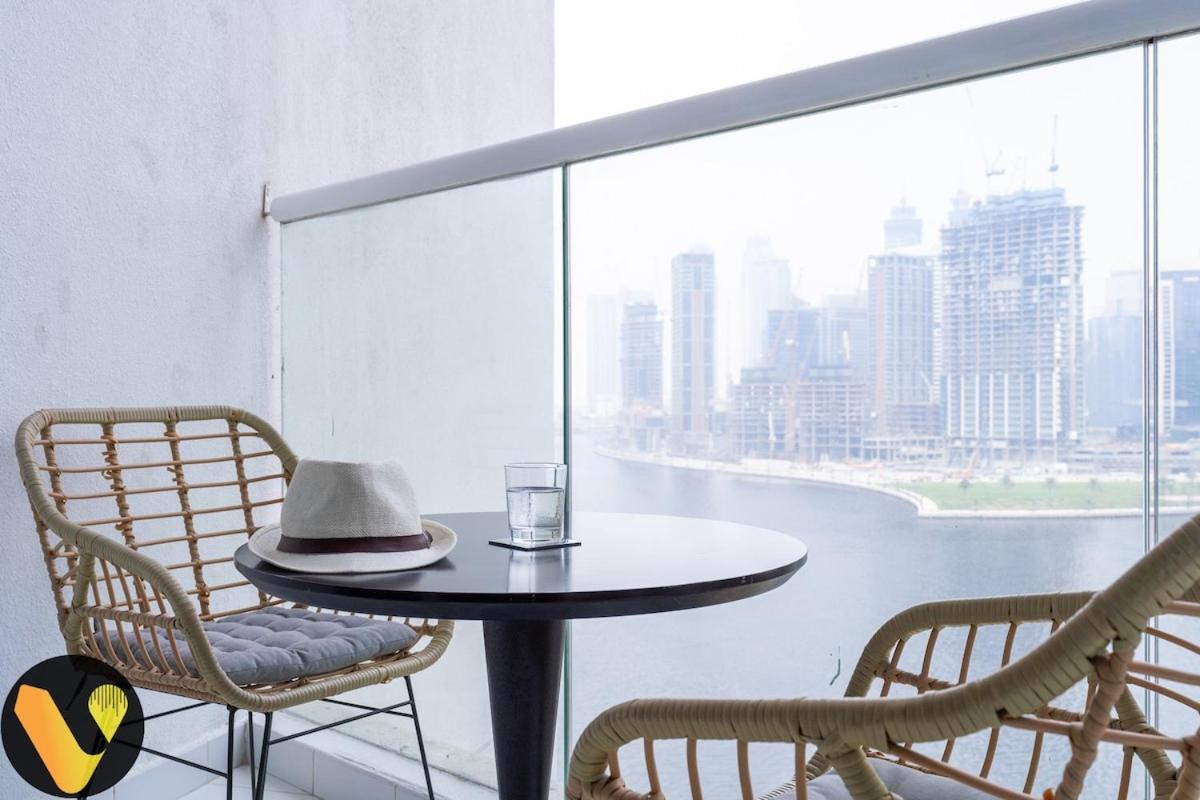 Vogue Vacation Homes, Business Bay Damac Maison Prive near Burj Khalifa and Dubai Mall, Studio Apartment with Balcony, Canal and City view, Access to all Amenities - 4