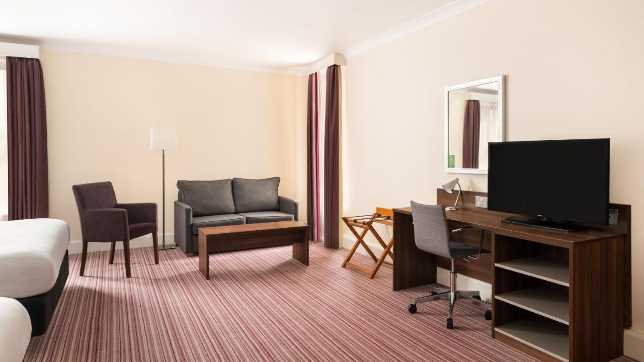 Premium Queen Room with Two Queens and One Sofa Bed