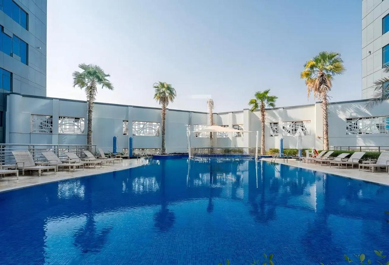 Spacious 1BR - Balcony & Pool View - Capital Bay - 3