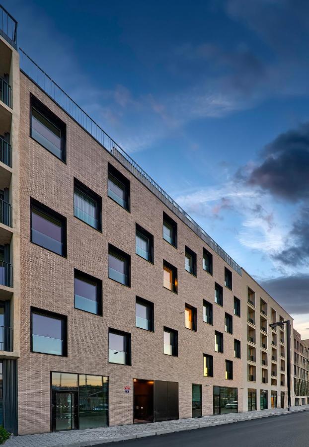 DownTown Suites Andel — quarto