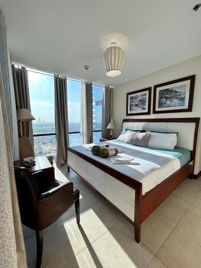 Click Stay - JLT - 2 Bedroom & Balcony Lakes view Entire Apartment -AZ