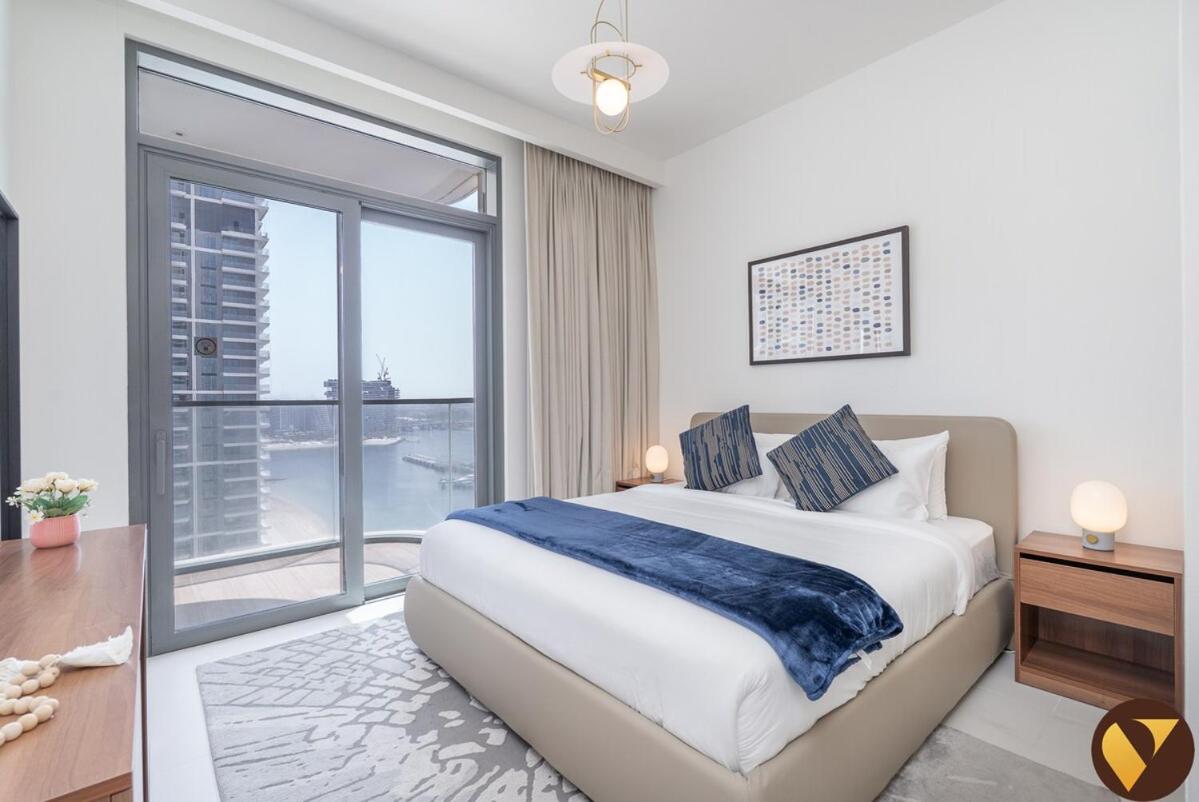 Vogue Vacation Homes, Emaar Beach Front Marina Vista near JBR and Palm Jumeirah, Two Bedroom Apartment with Balcony and Private Beach, Access to all Amenities - 5