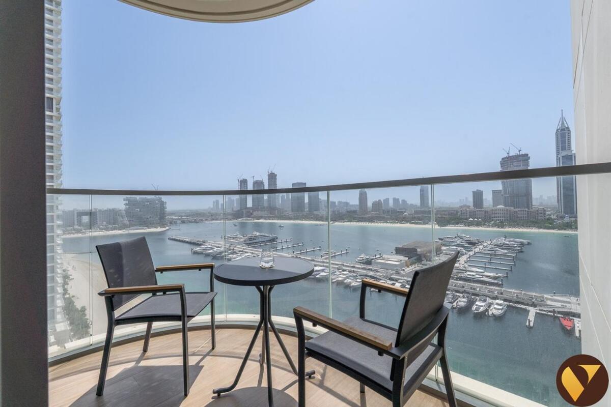 Vogue Vacation Homes, Emaar Beach Front Marina Vista near JBR and Palm Jumeirah, Two Bedroom Apartment with Balcony and Private Beach, Access to all Amenities - 4