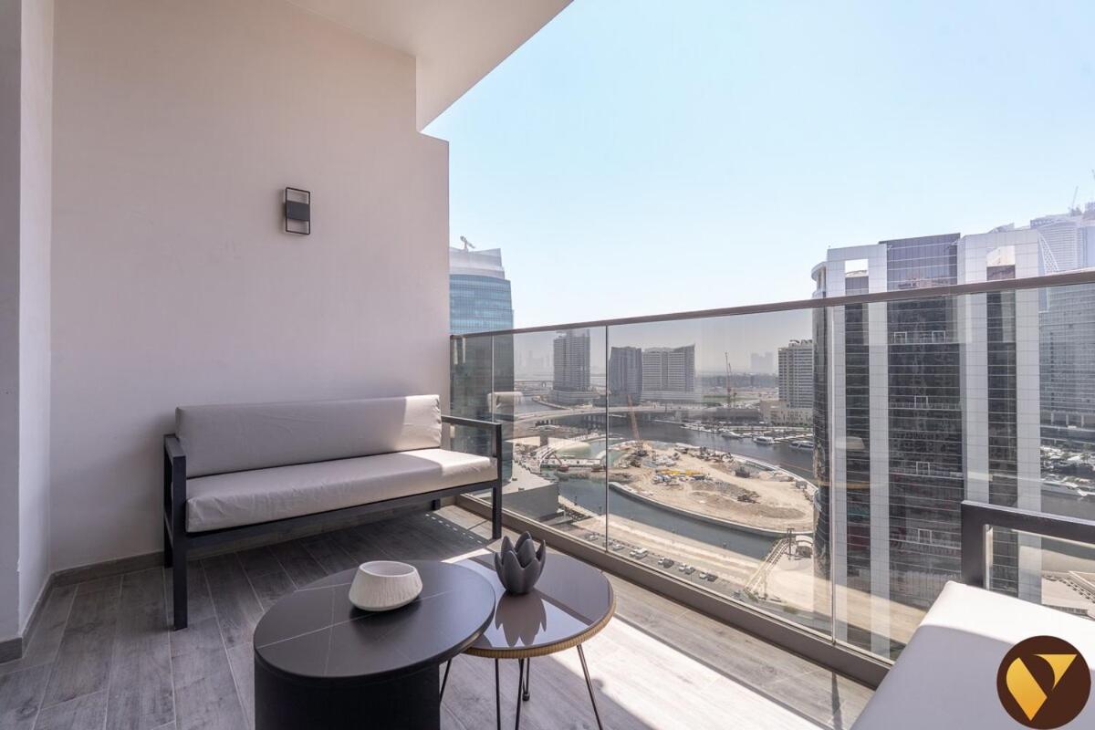 Vogue Vacation Homes, Downtown Mag318 near Burj Khalifa and Dubai Mall, Studio Apartment with Balcony, Canal and City View, Access to all Amenities - 3