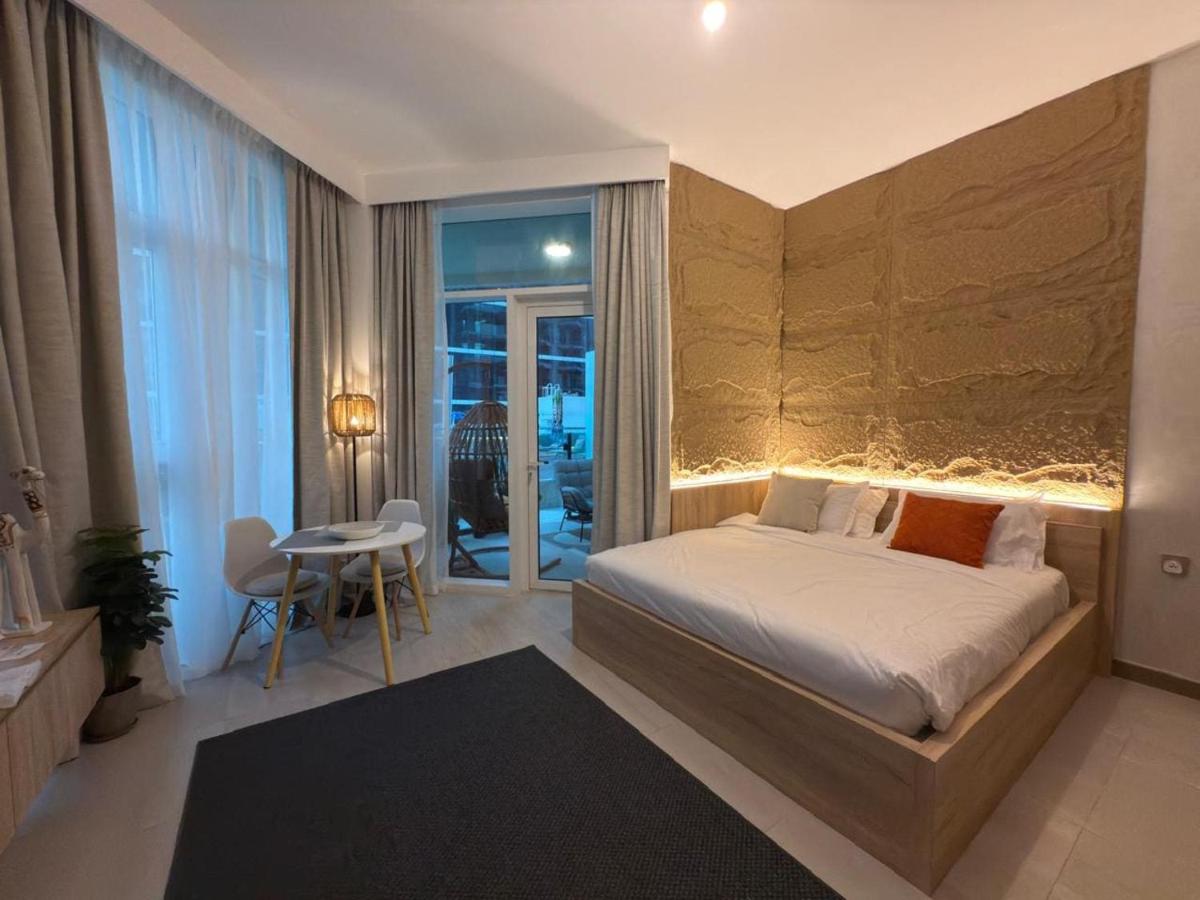 Cozy Studio with Balcony Pool View - Business Bay