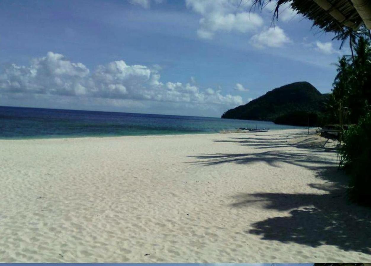 Beach: White Beach Front and Cottages