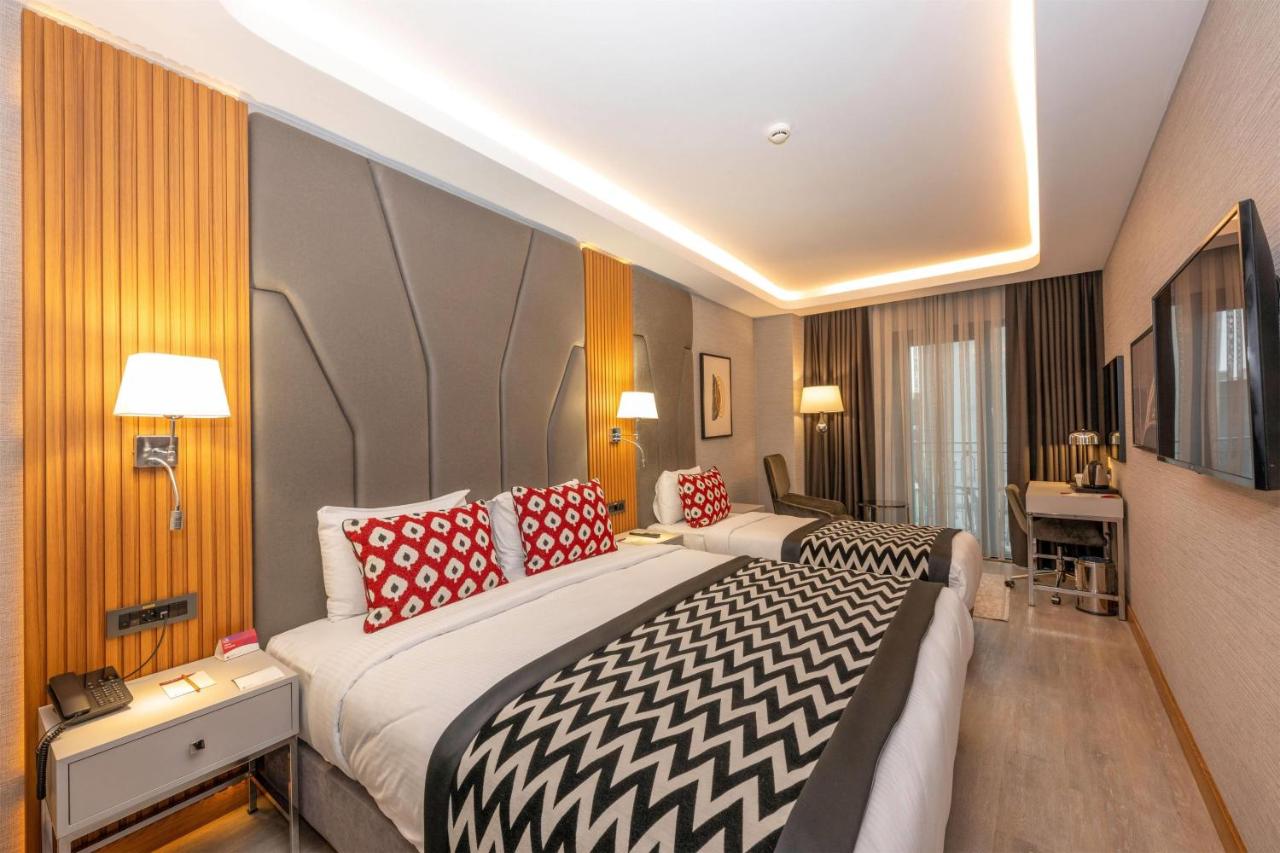 Deluxe Üç Kişilik Oda - Balkonlu