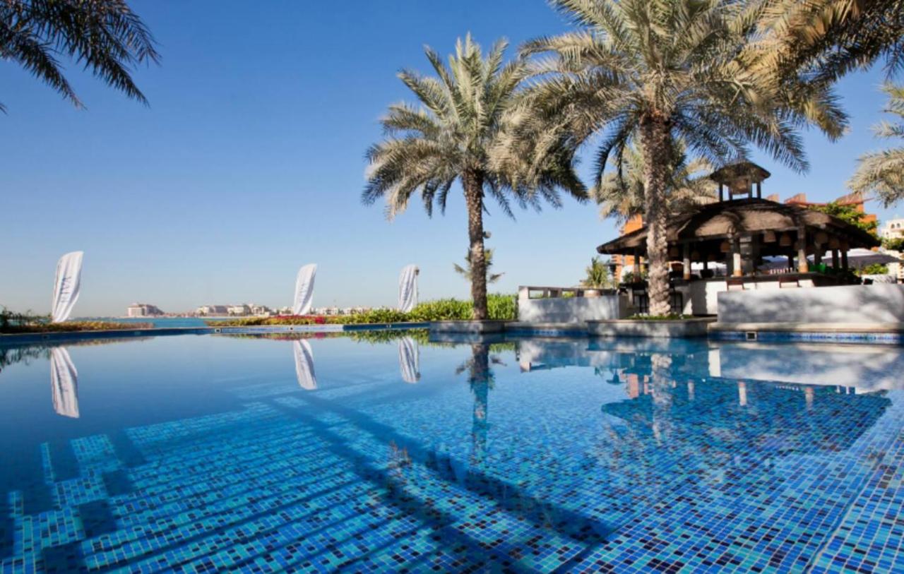 Premium 4BR Apt Pool Palm Beach Club Dubai - 4