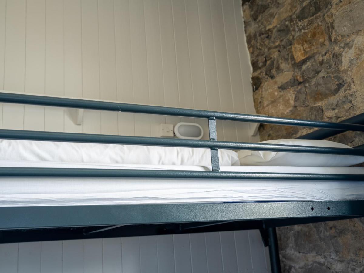 Bunk Bed in Male Dormitory Room with Shared Bathroom