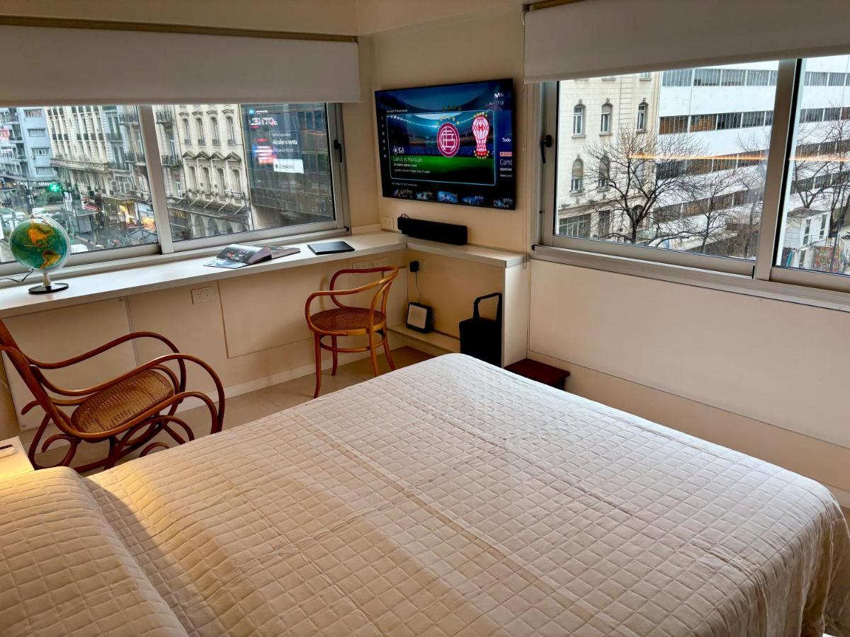 Moderno departamento sobre Av Corrientes con garage para autos - 2