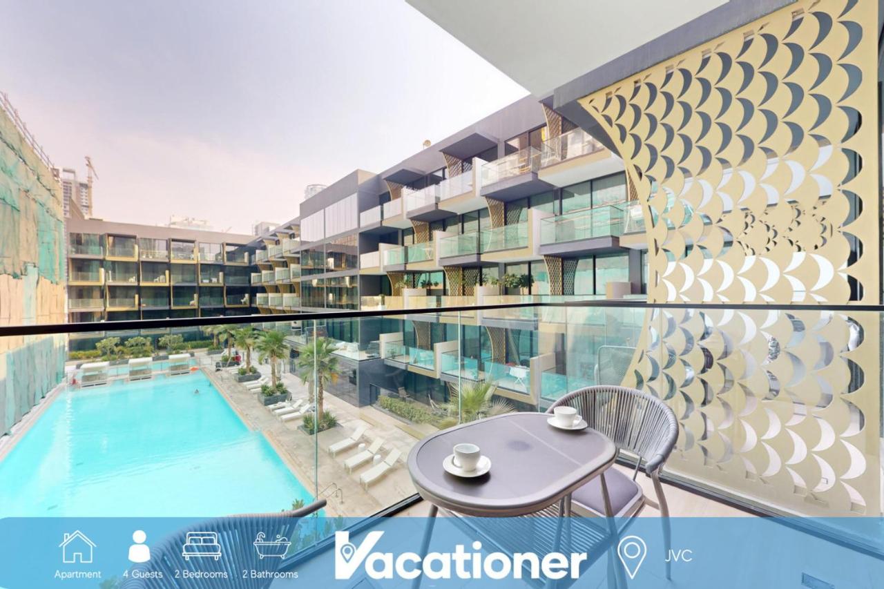 Vacationer Holiday Homes I Stylish 2 Bed l Balcony with Pool Views l JVC