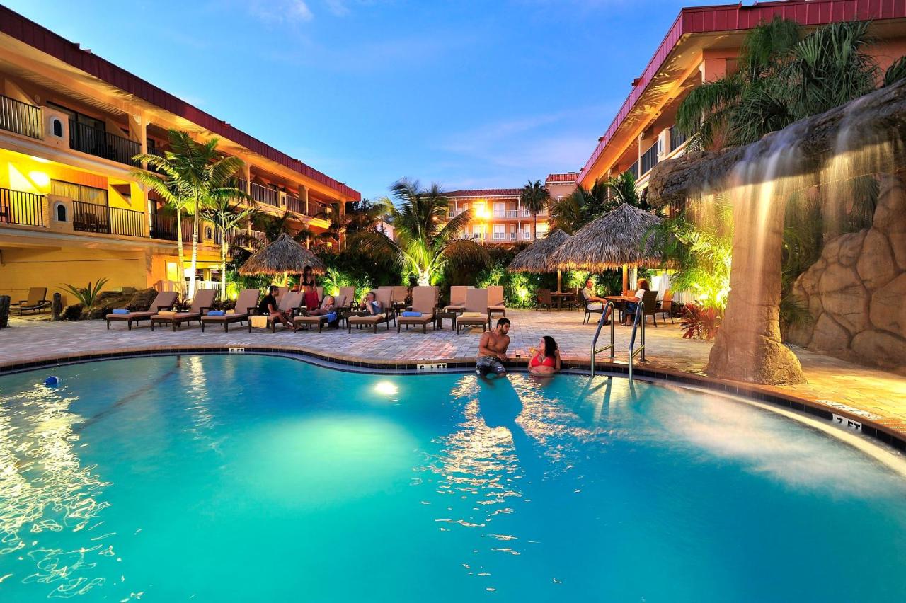 Heated swimming pool: Coconut Cove All Suite Hotel