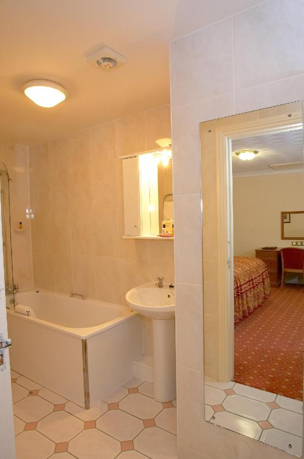 Potters International Hotel - Laterooms