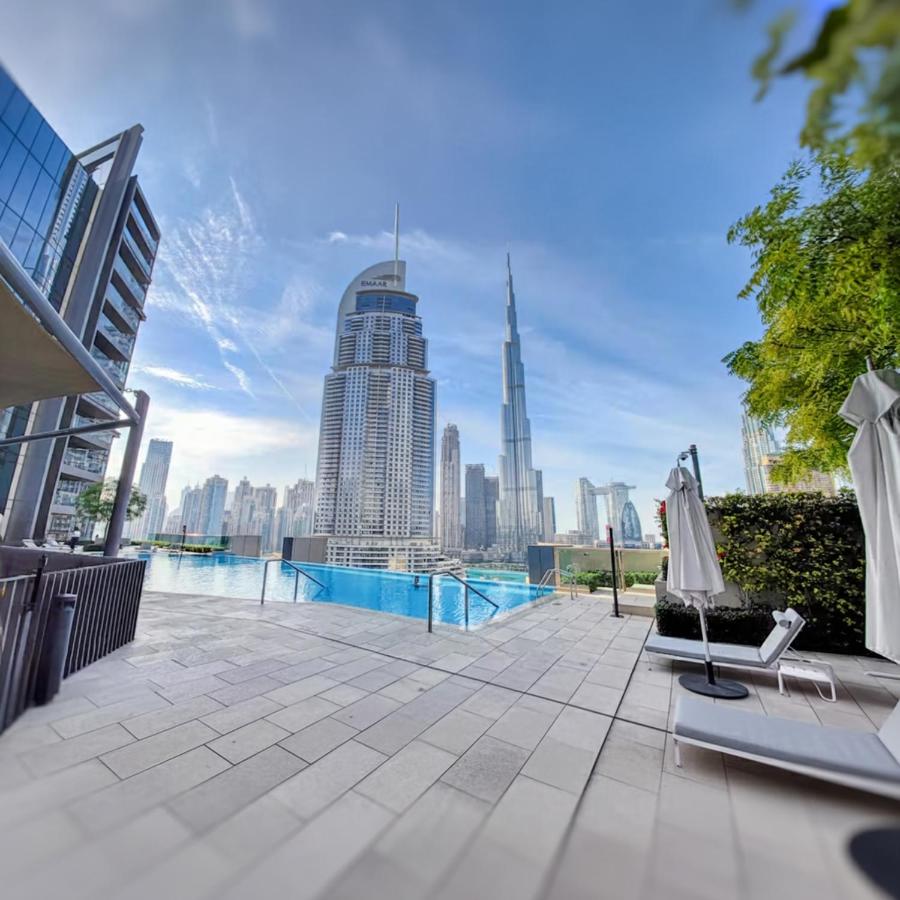 Skyline Aura 1 & 2 Bedroom Apartments I Burj Khalifa & Fountain Views I Dubai Mall Access I Parking, Gym, Wi-Fi & Infinity Pool