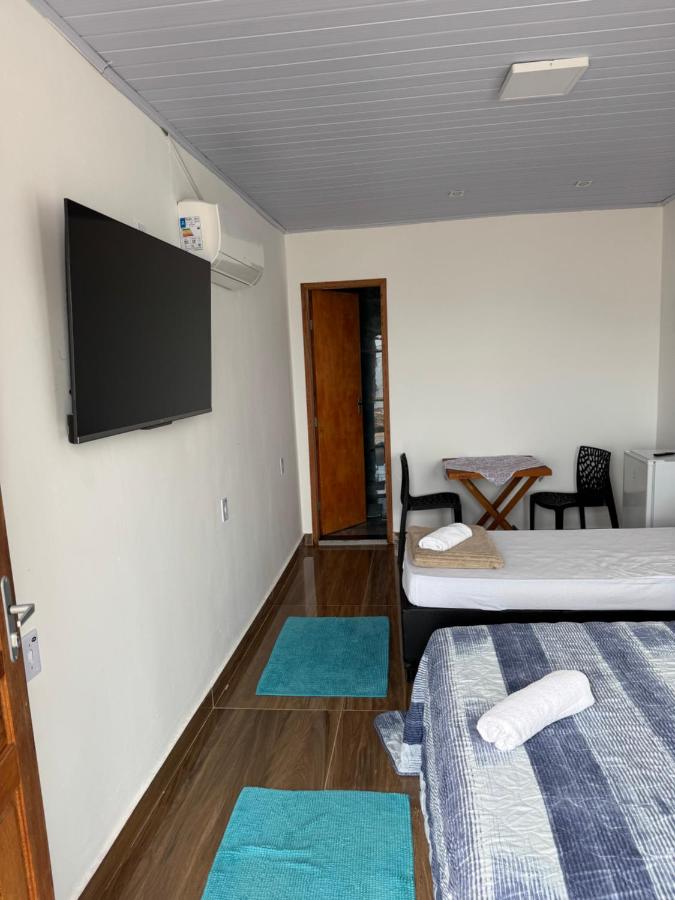 Suítes Abraão Beach — quarto