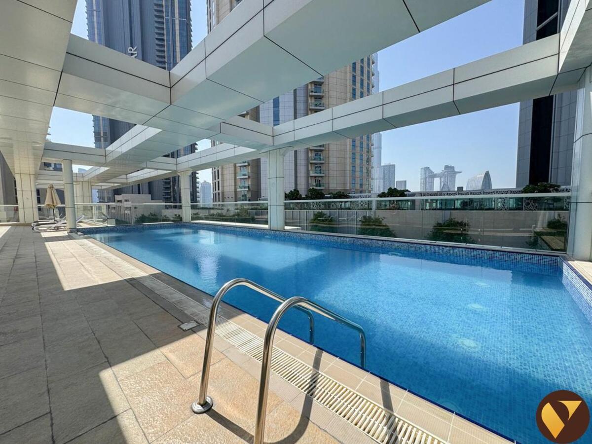 Vogue Vacation Homes, Downtown Mon Reve near Burj Khalifa and Dubai Mall, Two Bedroom plus kids room Apartment with Balcony and Access to all Amenities - 3
