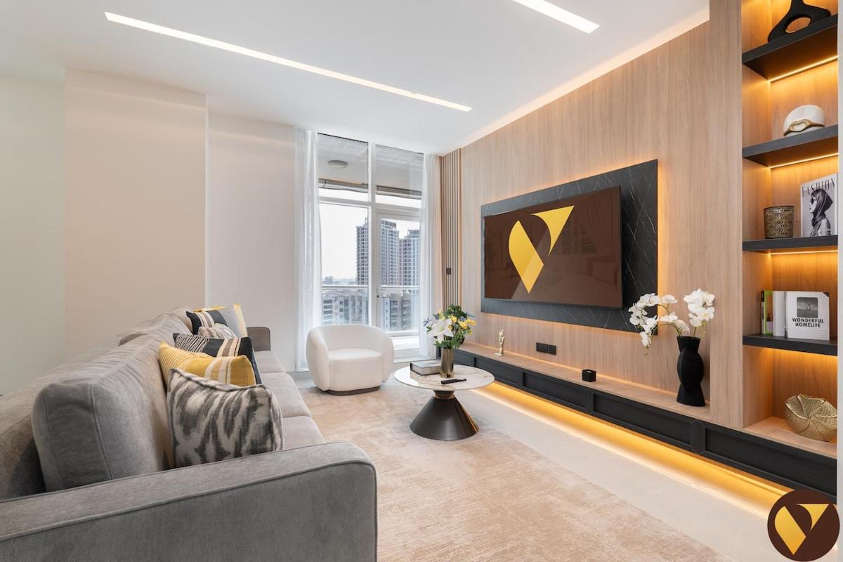 Vogue Vacation Homes, Marina Dorra Bay near JBR Beach and Ain Dubai, Two Bedroom apartment with Balcony, Canal and Skyline View, Access to all Amenities - 2