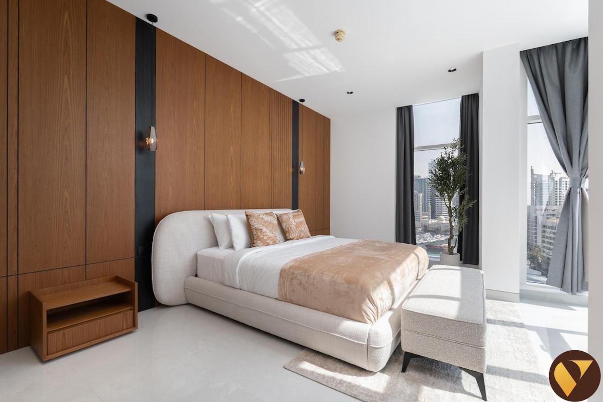 Vogue Vacation Homes, Marina Dorra Bay near JBR Beach and Ain Dubai, Two Bedroom apartment with Balcony, Canal and Skyline View, Access to all Amenities - 4