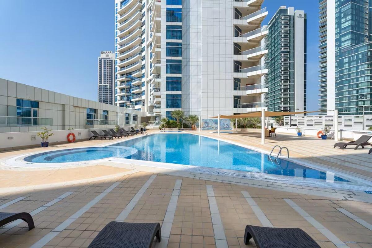 Vogue Vacation Homes, Marina Dorra Bay near JBR Beach and Ain Dubai, Two Bedroom apartment with Balcony, Canal and Skyline View, Access to all Amenities - 3