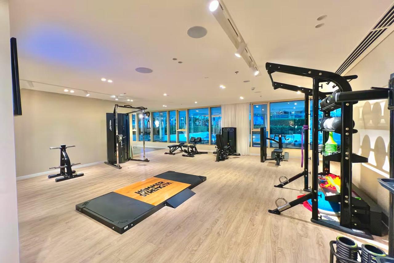 Vogue Vacation Homes, Emaar Beachfront Grand Bleu Designed by Elie Saab, near JBR and Palm Jumeirah, Two Bedroom Apartment with Balcony and Private Beach, Access to all Amenities - 5