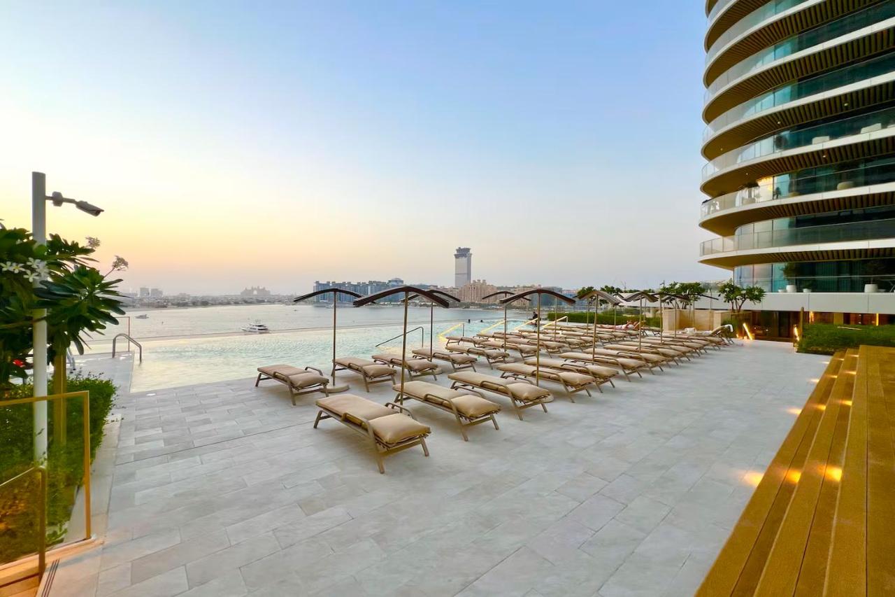 Vogue Vacation Homes, Emaar Beachfront Grand Bleu Designed by Elie Saab, near JBR and Palm Jumeirah, Two Bedroom Apartment with Balcony and Private Beach, Access to all Amenities - 3